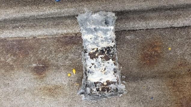 Failed conventional petrolatum tape peeling off